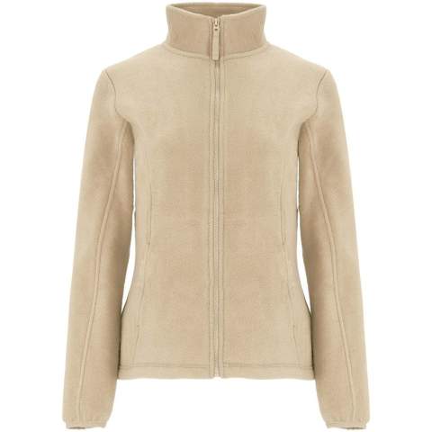 Fleece jacket with high lined collar and matching reinforced covered seams. Injected zip with matching puller made of fabric. Cuffs with elastic trim. Side pockets. Fitted-cut. Bottom hem with inner side adjusters. Removable label. The model is 179 cm and is wearing size S.