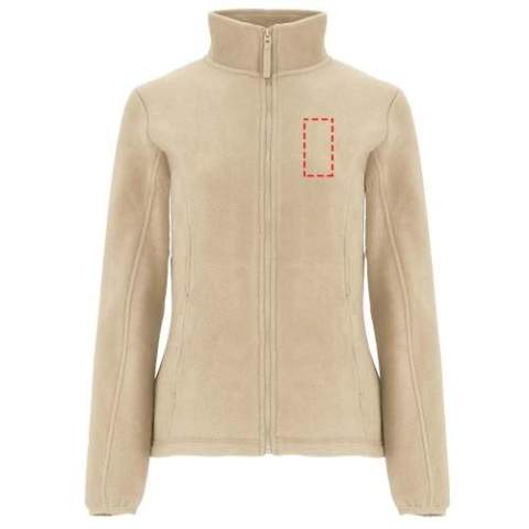 Fleece jacket with high lined collar and matching reinforced covered seams. Injected zip with matching puller made of fabric. Cuffs with elastic trim. Side pockets. Fitted-cut. Bottom hem with inner side adjusters. Removable label. The model is 179 cm and is wearing size S.