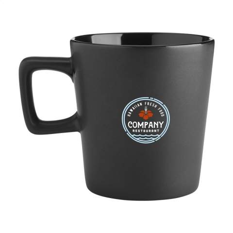 Modern mug made from high-quality ceramic and 5% recycled ceramic. The handle has an angular shape, creating an eye-catching design feature. The outside of the mug has a chic matte finish, the inside is finished in high gloss. Dishwasher-safe. Capacity 290 ml. NOTE: The white mug cannot be laser engraved because it is not sufficiently visible. Recycled ceramic mugs are manufactured by mixing raw materials with fragments of broken or unusable mugs collected in the same factory. These discarded components are finely ground into powder and then mixed with essential substances such as kaolin and quartz before being converted into new ceramic products. The final product usually consists of 5% to 10% recycled ceramics to ensure optimal quality. The use of recycled ceramics promotes the circular economy and reduces the need for new raw materials.