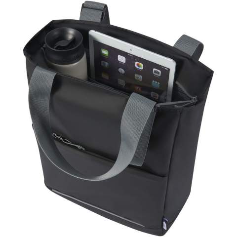 Water-resistant laptop tote bag made from GRS recycled materials, including the zips. It features a dedicated tablet sleeve, a 14” laptop compartment, multiple pockets for organisation, a front pocket with organisation panel, adjustable 35 cm long handles, and a luggage strap. The GRS recycled materials include the main fabric, lining, webbing, and zips. Capacity: 14 litres. PVC free.