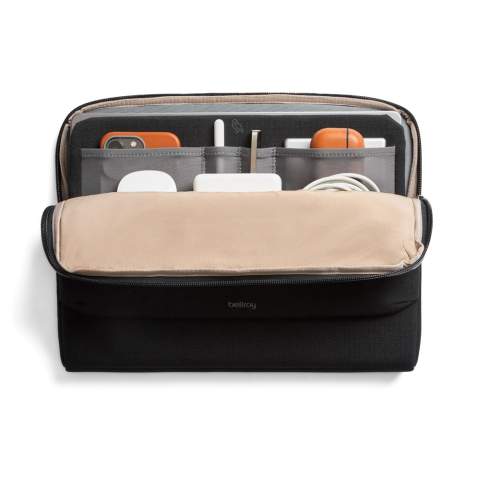 This all-in-one officemate keeps your key work tools neatly stowed and easy to access, from bag to desk to meeting room table. Fits laptops up to 16”. Foam padded laptop sleeve. Fold-down front pocket access. Two mesh pen slips. Additional storage space for bulky items. Water-resistant zip and fabric. Soft-touch interior lining.