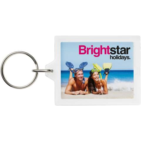 Clear rectangular E1 keychain with metal split keyring. The metal looped ring offers a flat profile which is ideal for mailings. Print insert dimensions: 4,5 cm x 3,5 cm.