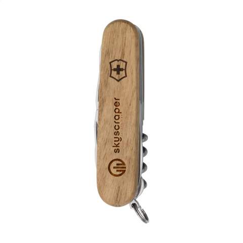 Original Swiss Victorinox pocket knife with a walnut wood handle. This wood comes from fallen branches and fallen trees. Each knife is unique thanks to the natural grain of the wood. connecting plates of hard-anodised aluminium and tools made of 100% recycled steel. 9-piece with 13 functions: large knife, small knife, cork screw, bottle opener with large screwdriver 6 mm, can opener with small screwdriver 3 mm, wire stripper, reamer with punch and sewing awl, scissors, wood saw, multifunctional hook and keyring. Includes instruction manual and lifetime warranty on material and manufacturing defects. Victorinox knives are a worldwide symbol for reliability, functionality and perfection. Please note local rules may apply regarding the possession and/or carrying of knives or multitools in public. Each item is individually boxed.