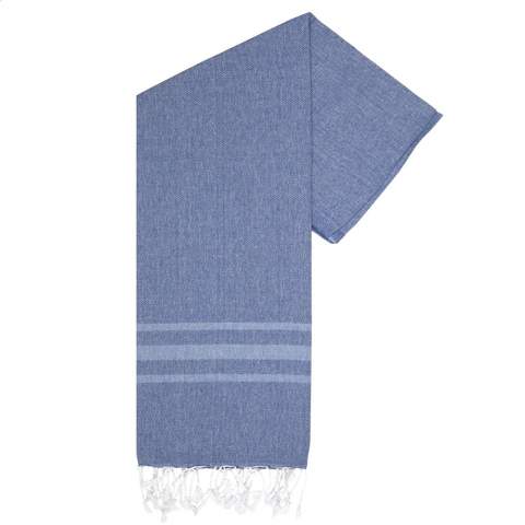A multifunctional hammam towel from Oxious. Made from 50% Oekotex certified cotton and 50% recycled industrial textile waste (140 g/m²). Vibe is a wonderfully soft and stylish cloth with a cool stripe pattern. Beautiful as a shawl, dress on the couch, luxurious (hammam) cloth or towel. The cloth is handmade. Vibe symbolizes relaxation in a cozy atmosphere and environment.  These beautiful, soft cloths are made by local women in a small village in Turkey. They work there in a social context, with room for growth and development. The cloths are handmade with love and care for the environment. Pure enjoyment can begin with a product from the Oxious collection. Optional: Each item supplied in a kraft cardboard envelope and/or with a kraft sleeve.