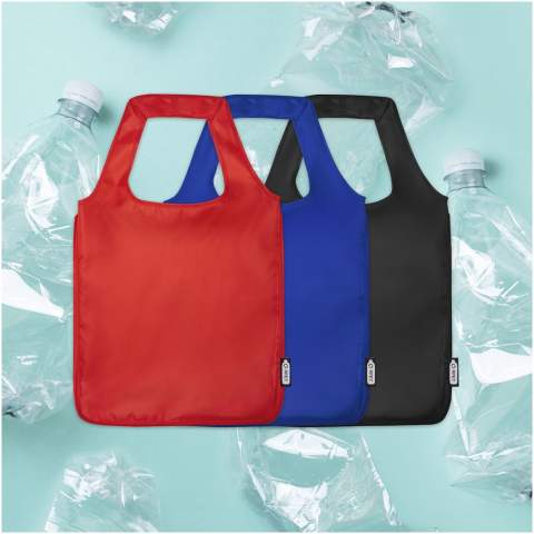 Die große Ash-Tragetasche aus recyceltem PET ist eine großartige Alternative zu Plastiktüten. Die Tasche ist bis zu 10 kg belastbar, verfügt über ein großes offenes Hauptfach und lässt sich dank der einfachen elastischen Schlaufe an der Öffnung zusammenfalten. Mit den 30 cm langen Griffen lässt sich die Tasche leicht über der Schulter tragen.