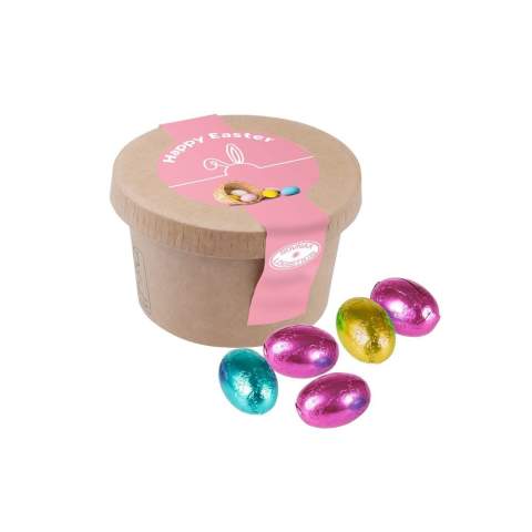 Cup made of unbleached cardboard, filled with approximately 112 grams of creamy Easter eggs and provided with a full color sticker on the lid