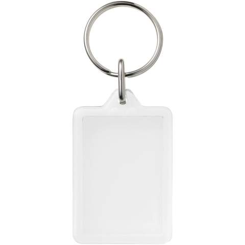 Porte-clés transparent Y1 rectangulaire avec anneau fendu en métal. L’anneau en forme de boucle métallique présente un profil plat idéal pour les envois. Dimensions de l’insert pour impression : 3,5 cm x 2,4 cm.