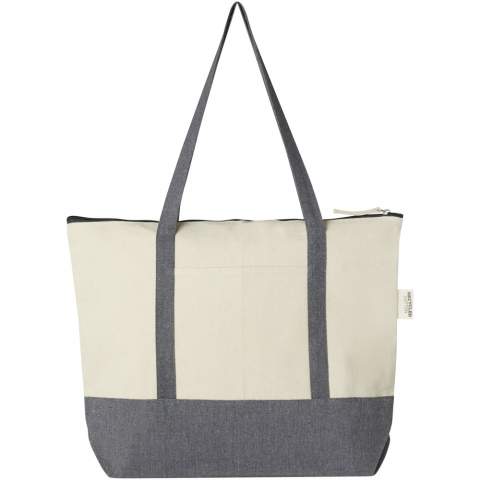 The Repose 320 g/m² recycled cotton zippered tote is made from eco-friendly, pre-consumer recycled cotton. Featuring a zippered main compartment, on-trend colour blocking, front slash pocket and 27 cm handles. Resistance up to 10 kg weight.