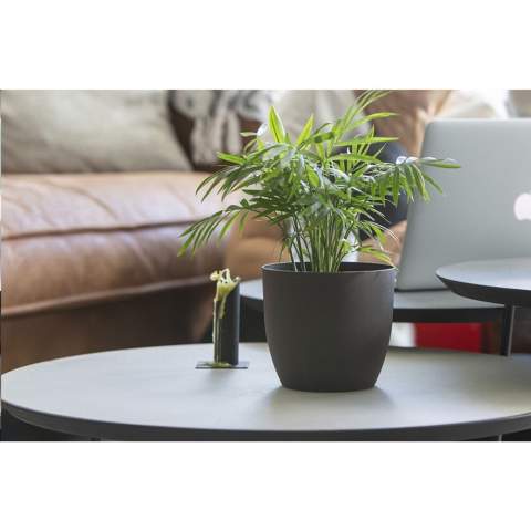 WoW! This fully compostable flower pot is made from the coffee grounds that come from making one cup of coffee. And it can be personalised with your company logo, making it the perfect flower pot to bring a little green into your office. Made in Holland.  In the Netherlands, 120 million kilos of coffee grounds are produced annually. The Coffee Based material is a mixture of used coffee grounds and a biopolymer. The biopolymer of the Coffee Based material is based on recycled raw materials from potato, grain, root or seed flour. The used coffee grounds are a waste stream from the coffee industry or the office environment. Made in Holland.      As coffee grounds are an organic material, they are naturally biodegradable. The biopolymer is also biodegradable and complies with EN13432 (standard for industrial composting). Each item is supplied in an individual brown cardboard box.