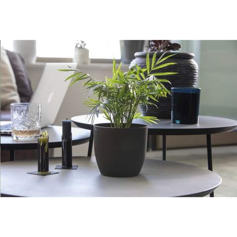 WoW! This fully compostable flower pot is made from the coffee grounds that come from making one cup of coffee. And it can be personalised with your company logo, making it the perfect flower pot to bring a little green into your office. Made in Holland.  In the Netherlands, 120 million kilos of coffee grounds are produced annually. The Coffee Based material is a mixture of used coffee grounds and a biopolymer. The biopolymer of the Coffee Based material is based on recycled raw materials from potato, grain, root or seed flour. The used coffee grounds are a waste stream from the coffee industry or the office environment. Made in Holland.      As coffee grounds are an organic material, they are naturally biodegradable. The biopolymer is also biodegradable and complies with EN13432 (standard for industrial composting). Each item is supplied in an individual brown cardboard box.