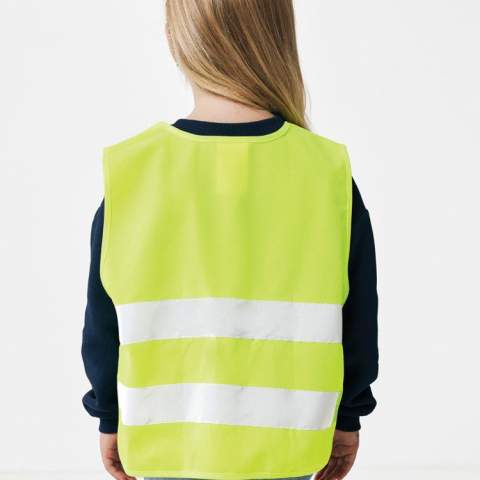 XS-sized high-visibility vest designed for children aged 3 to 6, with a height range of 90 to 140 cm. This vest features space for decoration on both the front and rear sides. It is equipped with hook and loop closures on the shoulders and at the bottom for added safety and easy donning. The elastic bands on the opposite side provide flexibility, allowing it to be comfortably worn over thick coats. This vest has rigorous testing and complies with EN 17353:2020 Type AB3. Furthermore, it adheres to the PPE guidelines specified in Regulation (EU) 2016/425 for Personal Protective Equipment Category II. Made with GRS certified recycled PET. Total recycled content: 55% based on total item weight. GRS certification ensures a completely certified supply chain of the recycled materials.
