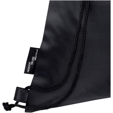 The Ash foldable recycled drawstring bag features a main compartment with cinch closure, and a zippered front pocket that the bag can easily fold up into for easy transport and storage. 