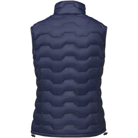 The Epidote women's GRS recycled insulated bodywarmer – a sustainable and stylish outerwear choice for environmentally-conscious adventurers. Crafted with precision and care, this bodywarmer is fully GRS certified, making it a more sustainable addition to your wardrobe. Designed for comfort and warmth, the honeycomb quilted pattern shows a modern design and enhances insulation, while the GRS certified recycled nylon dull cire 380T woven fabric provides durability and weather resistance. Even the trims and accessories, including zippers, are thoughtfully sourced from recycled materials, ensuring every aspect of this bodywarmer contributes to a greener planet. Equipped with practical features, the Epidote bodywarmer has front pockets with zippers and an inside left bottom pocket for secure storage. The inner stormflap with chin guard shields you from the elements, while the elastic drawstring with adjustable cord lock in the bottom hem allows for a customised fit. The elastic binding on the hood ensures added protection against cold winds. The RDS certified recycled feathers provides warmth without compromising on ethical standards. With GRS certification guaranteeing a 100% certified supply chain, this garment truly represents an environmentally conscious choice. This bodywarmer is designed with a fitted shape for a feminine look.