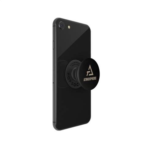 Die PopSockets® sind ein praktisches multifunktionales Telefonzubehör. Mit austauschbarem PopGrip aus Kunststoff und elegantem, austauschbarem PopTop aus Aluminium. Befestigen Sie diesen Artikel mit dem 3M-Klebestreifen auf der Rückseite Ihres Telefons und nutzen Sie die praktischen Funktionen: komfortabler Griff für extra Halt, funktioneller Ständer und Selfie-Halter. Zum Positionieren in 2 verschiedenen Popup-Positionen und flexibel, so dass Sie das Smartphone in jede gewünschte Position bringen können. Der PopSocket® ist leicht zu entfernen und kann bis zu 10 Mal wiederverwendet werden. Geeignet für alle gängigen Modelle von Smartphones, iPhones und anderen Geräten. Lesen Sie zur optimalen Verwendung und Aufbewahrung des PopSocket® die mitgelieferte Anleitung.       Zusätzliche Informationen zur Lieferzeit inkl. Aufdruck: 120 - 2500 Stück 1 Woche, 2500 - 5000 Stück: 2 Wochen. Ab 5.000 Stück Preis und Lieferzeit auf Anfrage.  PopSockets® werden nur mit Lasergravur geliefert.