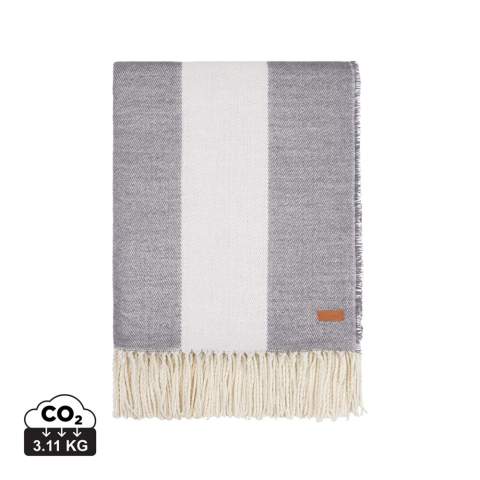 With its timeless design and classic broad-striped pattern, it seamlessly complements any home decor. Crafted from a blend of 60% Polylana® and 40% acrylic, this blanket provides exceptional softness and ensures you stay warm and comfortable. Features the AWARE™ tracer technology, validating the genuine use of recycled materials. 2% of the proceeds of each product sold will be donated to Water.org.