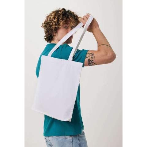 Pas de greenwashing, mais une vraie histoire sur la durabilité ! La collection Impact est réalisée à l'aide du traceur AWARE™. Avec AWARE™, l'utilisation de matériaux textiles recyclés authentiques et les allégations d'impact sur la réduction de la consommation d'eau sont garanties. Économisez l'eau et utilisez des tissus recyclés authentiques. Si vous choisissez cet article, vous économisez 1200 litres d'eau. Le coton recyclé AWARE™ ne nécessite pas d'eau ! 2 % des recettes de chaque produit Impact vendu seront reversés à Water.org. Sac fourre-tout en coton recyclé AWARE™ (330 g/m2) au design simpliste, avec deux poignées supérieures qui peuvent être portées à l'épaule ou à la main. Ce fourre-tout est fait à 100 % de matériau recyclé, ce qui permet d'économiser des milliers de litres d'eau.<br /><br />PVC free: true
