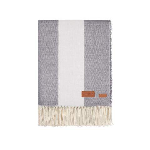 With its timeless design and classic broad-striped pattern, it seamlessly complements any home decor. Crafted from a blend of 60% Polylana® and 40% acrylic, this blanket provides exceptional softness and ensures you stay warm and comfortable. Features the AWARE™ tracer technology, validating the genuine use of recycled materials. 2% of the proceeds of each product sold will be donated to Water.org.