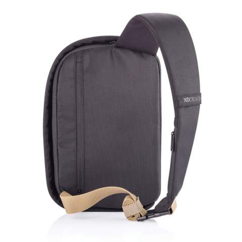 Safe, comfortable, and smart, the Bobby Sling was designed for city travelers. Feel protected with the famous Bobby anti-theft features like hidden zippers, no front access, RFID protected pocket, and cut-resistant material.  There is also a 3-point safe buckle, ensuring your daily essentials are always along your body. Additional features like water-resistant material and an integrated USB charging port make this crossbody backpack the most convenient option for your everyday journey. Made from R-pet fabric with the AWARE™ tracer. With AWARE™, the use of genuine recycled fabric is guaranteed. 37% Recycled content. Registered design®<br /><br />FitsLaptopTabletSizeInches: 9.7<br />PVC free: true