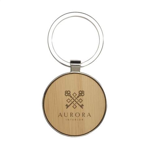 Circular, polished metal and bamboo keyring. A sturdy design made to be a sustainable and responsible product. Each item is supplied in an individual brown cardboard envelope.