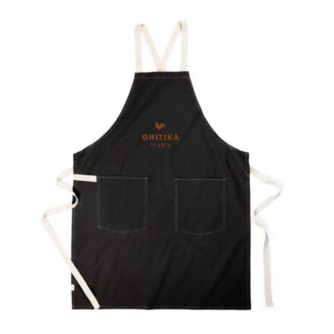 Apron made from 70% certified recycled cotton from suppliers' cotton waste. Fibres that are usually considered unusable have, with the appropriate manufacturing process, achieved the desired properties. This apron is extra wide to provide maximum protection. Two large front pockets and a loop for hanging utensils or a tea towel.