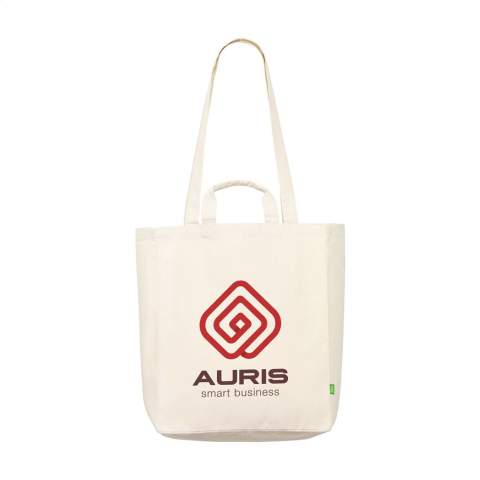 WoW! Sac à provision robuste en toile 100% coton biologique tissé (280 g/m²). Ce sac a des anses courtes et longues et peut ainsi être porté de plusieurs manières. Ce sac a aussi un petit compartiment de rangement à l'intérieur. Idéal pour remplacer les sacs en plastique à usage unique. Certifié GOTS. Capacité env. 19 litres.