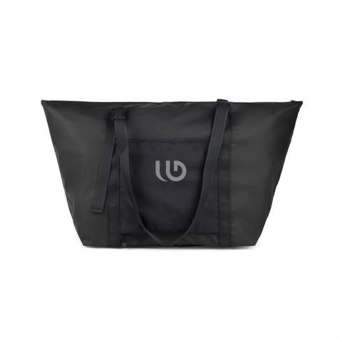 A perfect travel companion, this weekend bag is crafted from super lightweight GRS certified polyester with a sleek PU coating. Simply fold it and secure with the clever strap and buckle for storing compactly when not in use. Featuring a clever outer pocket that transforms into a secure trolley sleeve that allows you to slip it over a wheeled suitcase or trolley. Featuring adjustable straps to carry by hand or over your shoulder. Smaller inner pocket for your essentials. These versatile bags are not only easy to carry but are also designed to fold and store compactly in your luggage, providing convenient extra storage without weighing you down. Certified by GRS (Global Recycled Standard), this certification guarantees that the entire supply chain of the recycled materials is certified. The total recycled content is based on the overall product weight. This product contains 52% GRS certified recycled polyester.