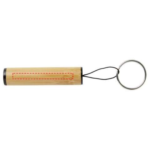 The Cane bamboo key ring with light is a compact and versatile accessory designed to provide you with convenient illumination whenever you need it. Just pull the polyester string to shine your light. The key ring can easily be attached keys, backpack, or any other personal belongings. The body is made of durable ABS material, ensuring long-lasting performance, and the outer case is crafted from bamboo, adding a touch of natural beauty to its design. Delivered with 3 LR41 batteries. Light capacity: 1.5V/30mAh. 
