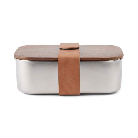 Ciro RCS recycled steel lunch box is a practical and eco-friendly lunch solution that is designed with care for both functionality and environmental awareness. The lid, made of FSC®-certified acacia wood, features a convenient PU strap with velcro closure, ensuring secure transport. Acacia wood is an organic material where variations in shade and colour are natural characteristics. With this lunch box, you can easily enjoy your meals while taking a step towards reducing the use of disposable containers and plastic. Certified by RCS (Recycled Claim Standard), RCS certification guarantees that the entire supply chain of recycled materials is certified. The total recycled content is based on the overall product weight. This product contains 39% RCS-certified recycled stainless steel. Easy to clean. Handwash only. Including FSC®-certified kraft packaging.