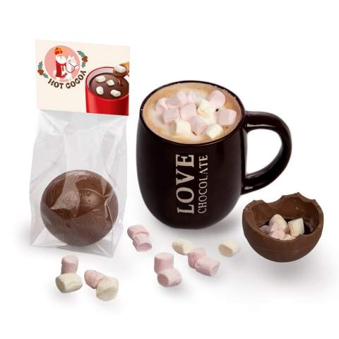 Transparenter Blockbeutel mit vollfarbig bedruckter Kopfkarte, gefüllt mit einer Schokomilchkugel mit Mini-Marshmallows