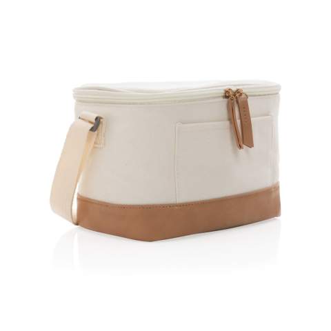 Neem je favoriete eten of drinken mee in deze chique koeltas! In dezee koeltas passen gemakkelijk 6 blikjes, de koeltas heeft een open voorvak en een hengsel voor gemakkelijk dragen. Gemaakt van hoge kwaliteit 16oz. gerecycled canvas en mooie PU details. Met AWARE™ tracer die het echte gebruik van gerecycled katoen valideert. 2% van de opbrengst van elk verkocht Impact-product wordt gedoneerd aan Water.org. Samenstelling 60% gerecycled katoen en 40% gerecycled polyester. Voering in PEVA.<br /><br />PVC free: true