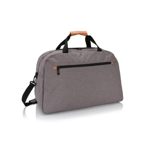600D 2 tone polyester travel bag with fashionable brown details on the handles and zippers.<br /><br />PVC free: true