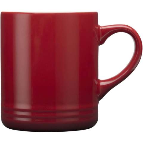 Ceramic mug that features a stylish design with a subtle gradient colour effect. Features a glossy cream coloured interior and a glossy exterior. Dishwasher safe. Presented in a recycled cardboard gift box. Volume capacity: 330 ml.