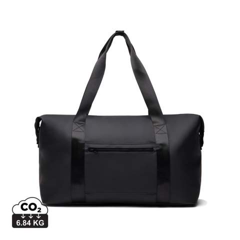 A travel sized weekend bag crafted from partly RCS certified recycled polyester with a sleek PU coating. Designed to accommodate everything you need for a 1-2 night getaway. Simply secure your bag to your trolley with a clever 2-in-1 zip pocket. Featuring both comfortable carry hand-hold straps and a detachable adjustable shoulder strap. Inside a smaller zip pocket for your essentials. Certified by RCS (Recycled Claim Standard), RCS certification guarantees that the entire supply chain of recycled materials is certified. The total recycled content is based on the overall product weight. This product contains 20% RCS certified recycled polyester.