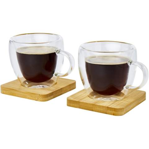 A set of 2 double-wall thermal glasses with bamboo coaster. The bamboo comes from sustainable, environmentally, and socially responsible sources. Thanks to the double borosilicate glass, the temperature of the drink is retained for a long time. Volume capacity is 100 ml. Coaster size: 8 x 8 x 1 cm.
