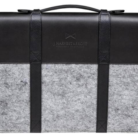 Document folder with a stylish combination of leather and felt. Our beloved J.Harvest & Frost logo are embossed nicely in the leather  in the front, between 2 leather straps. They are for the convenience open, so you can place your daily newspaper there when on the run.<br />Inside of documenter has lining in felt and multiple open pockets. It also shows some nice contrast color of royal blue felt behind pocket, to give the documenter the little extra twist.