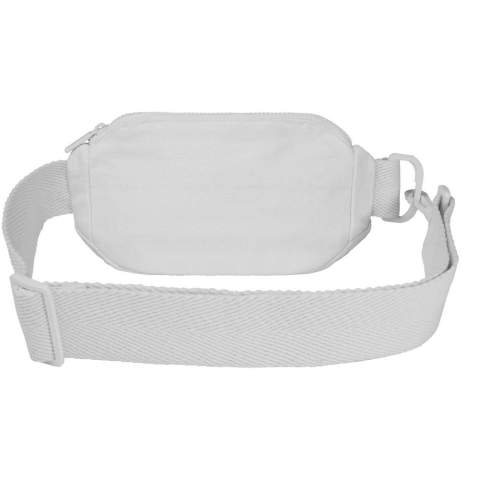 Crossbody bag made of 500 g/m² Aware™ recycled cotton and recycled polyester, featuring a spacious main compartment with a secure zipper closure and adjustable strap for comfortable wearing. The bag incorporates Cyclo® recycled fibres where they use pre-sorted waste that determines the colour of the yarn. These fibres do not only reduce the demand for virgin resources but also exhibit a commitment to a circular life, embodying the essence of reducing waste and promoting a closed-loop system. Each bag also comes with an Aware™ tracer. This innovative feature allows users to trace the origins and journey of their item through a QR code, enhancing transparency in the supply chain and fostering a stronger connection between the product and its production process.
