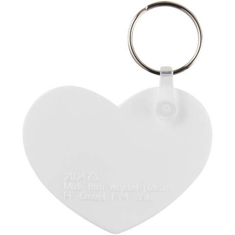 Porte-clés blanc en forme de cœur avec anneau métal. L’anneau en forme de boucle métallique présente un profil plat idéal pour les envois.
