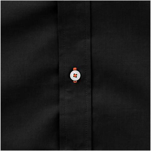 Button-down collar. Adjustable cuff with single pleat. Second buttonhole from the bottom with orange stitching. Satin piping at inside neck. Engraved pearl buttons. Heat transfer main label for tagless comfort.