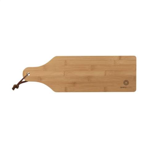 WoW! Serving board with leather cord. This board has a striking elongated shape and is ideal for serving tapas. Made from attractive and robust bamboo. Durable, ecologically sound, antibacterial and easy to clean.  NOTE: Due to the natural grains and contours of bamboo, we cannot guarantee consistency in depth/colour of the engraving. Each item is supplied in an individual brown cardboard box.