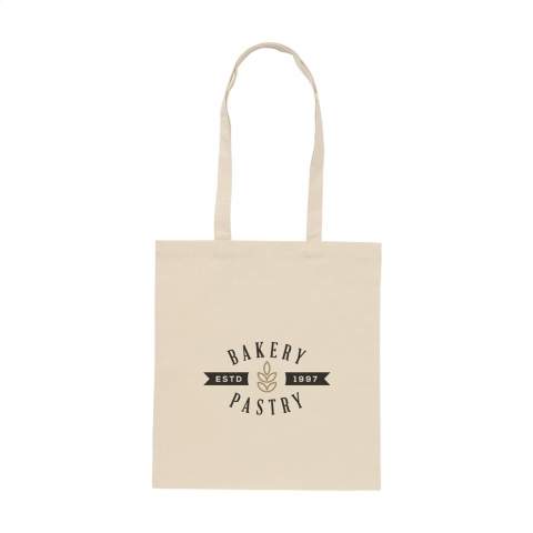 WoW! Sustainable shopping bag made from 100% firm-woven recycled cotton (180 g/m²). With long handles. GRS certified. Capacity approx. 7 litres.  If you choose this product, you choose sustainable cotton. This cotton is recycled. As a result, the colour may vary per product.