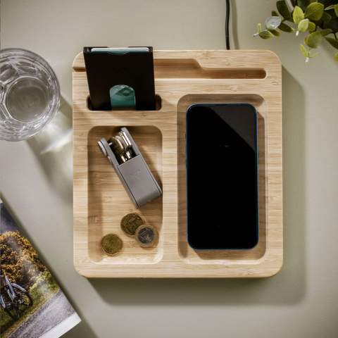 Desk organizer and wireless 15W phone charger in one, with cable with USB-C connector. This desk accessory is made from bamboo. The built-in magnetic wireless fast charger is compatible with all devices that support Qi wireless charging. Give this organizer a permanent place on your desk and collect your coins, paper clips, stationery, glasses, keys or your wallet. This way, your desk is tidy and all important things are clearly arranged. Includes user manual. Each item is supplied in an individual brown cardboard box.