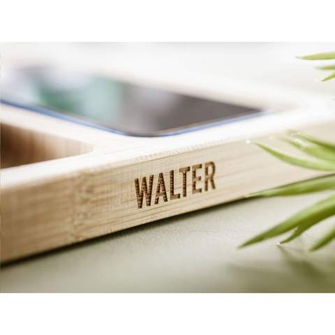 Desk organizer and wireless 15W phone charger in one, with cable with USB-C connector. This desk accessory is made from bamboo. The built-in magnetic wireless fast charger is compatible with all devices that support Qi wireless charging. Give this organizer a permanent place on your desk and collect your coins, paper clips, stationery, glasses, keys or your wallet. This way, your desk is tidy and all important things are clearly arranged. Includes user manual. Each item is supplied in an individual brown cardboard box.