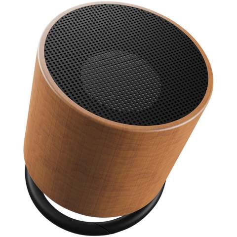 3W maple wood Bluetooth speaker with carved logo and a double sound output for an unparalleled sound quality for a speaker this size. The ring speaker can be tilted to direct the sound in any direction. Has built-in microphone and conference call function. Capacity: 500 mAh - 3.7 V battery. Frequency: 50 Hz - 20 KHz. Sound output: 1 x 3 W. Impedance: 4 Ω. Bluetooth® 5.0. Net weight: 100 grams. Size: ∅ 50 mm x 45 mm. Comes with a gift box with magnetic closure, made out of recycled paper.