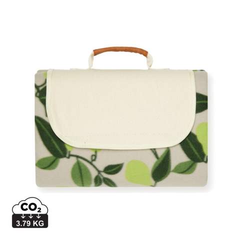 Picnic blanket in soft fleece with cotton canvas and faux leather details. The fleece is made of 100% GRS certified RPET. GRS certification ensures a completely certified supply chain of the recycled materials. The back is made in PEVA, which repels water. Clever construction makes it easy to fold up and take with you. Total recycled content: 56% based on total item weight.