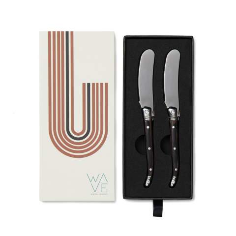 Exclusive 2-piece stainless steel butter knife set. These knives are perfect for spreading butter or jam on toast, bagels, muffins and more. The high-quality stainless steel blades ensure a smooth and effortless spread, while the sturdy pakka wood handles provide a comfortable grip. The set comes packed in an exclusive gift box, making it an ideal gift for any occasion.