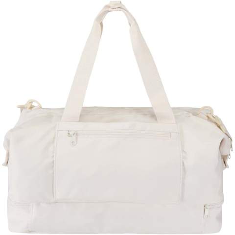 The Trip Aware™ recycled travel duffel bag is a versatile and spacious companion, ideal for short getaways and carrying all your essentials with ease. Made from durable 290D twill polyester with a soft knitted backing and lined with RPET 210D/PU, it is designed for practical use and comfort. The main compartment includes a large zipped pocket with dedicated storage for a passport, pens, and a key ribbon, along with two internal slide pockets and dual water bottle holders. A separate bottom compartment opens in a clamshell style, perfect for storing shoes or separating gear. Each bag also comes with an Aware™ tracer. This innovative feature allows users to trace the origins and journey of their item through a QR code, enhancing transparency in the supply chain and fostering a stronger connection between the product and its production process. Volume capacity: 42 litres.