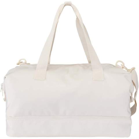 The Trip Aware™ recycled travel duffel bag is a versatile and spacious companion, ideal for short getaways and carrying all your essentials with ease. Made from durable 290D twill polyester with a soft knitted backing and lined with RPET 210D/PU, it is designed for practical use and comfort. The main compartment includes a large zipped pocket with dedicated storage for a passport, pens, and a key ribbon, along with two internal slide pockets and dual water bottle holders. A separate bottom compartment opens in a clamshell style, perfect for storing shoes or separating gear. Each bag also comes with an Aware™ tracer. This innovative feature allows users to trace the origins and journey of their item through a QR code, enhancing transparency in the supply chain and fostering a stronger connection between the product and its production process. Volume capacity: 42 litres.