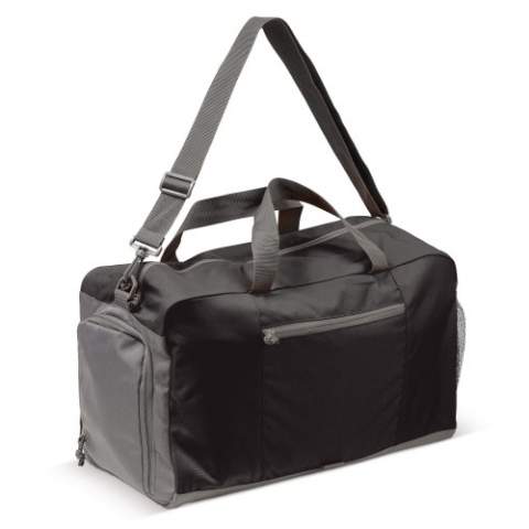 Spacious travel bag suitable for many purposes like a weekend trip or the gym. A special pocket keeps dirty shoes separate from other gear. The detachable and adjustable shoulder strap gives extra flexibility. On the front there is a zippered pocket. The reflective patch gives extra visibility in the dark.