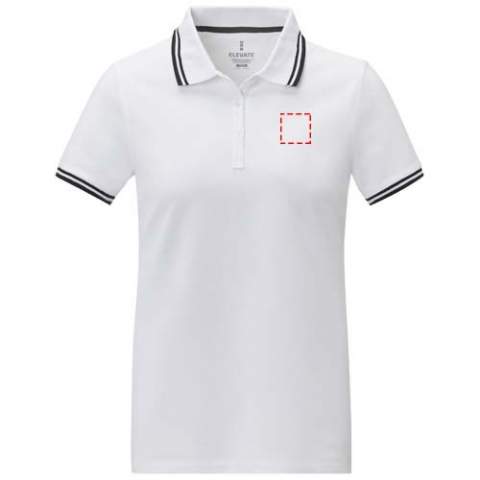 The Amarago short sleeve women's polo is the example of timeless style and contemporary elegance. Made from a high-quality 200 g/m² piqué knit cotton fabric, this polo offers exceptional comfort and durability. Featuring a unique tipping detail on the collar and cuffs, and the contrasting colours create a stylish and modern aesthetic, making it a standout choice for any occasion. This polo is designed with a fitted shape for a feminine look.