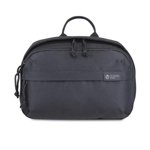 A modern and sustainable update to your go-to toiletry bag using recycled fabric and webbing made from plastic bottles. Front zippered pockets for storing travel essentials. Large zippered main compartment with interior pockets to keep your toiletries organised. Top grab handle. Includes AWARE™ Virtual ID & Product passport, which delivers an indisputable way to track and validate textile composition impact from origin to consumer. To access, scan the QR code located inside the product or visit wearaware.co to learn more. Available across both sides of the Atlantic. This item is also offered by Gemline for customers in the US and Canada.<br /><br />PVC free: true